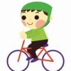 A boy is riding on the bike with his eyes closed.