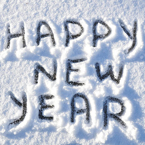 Happy New Year written in snow.